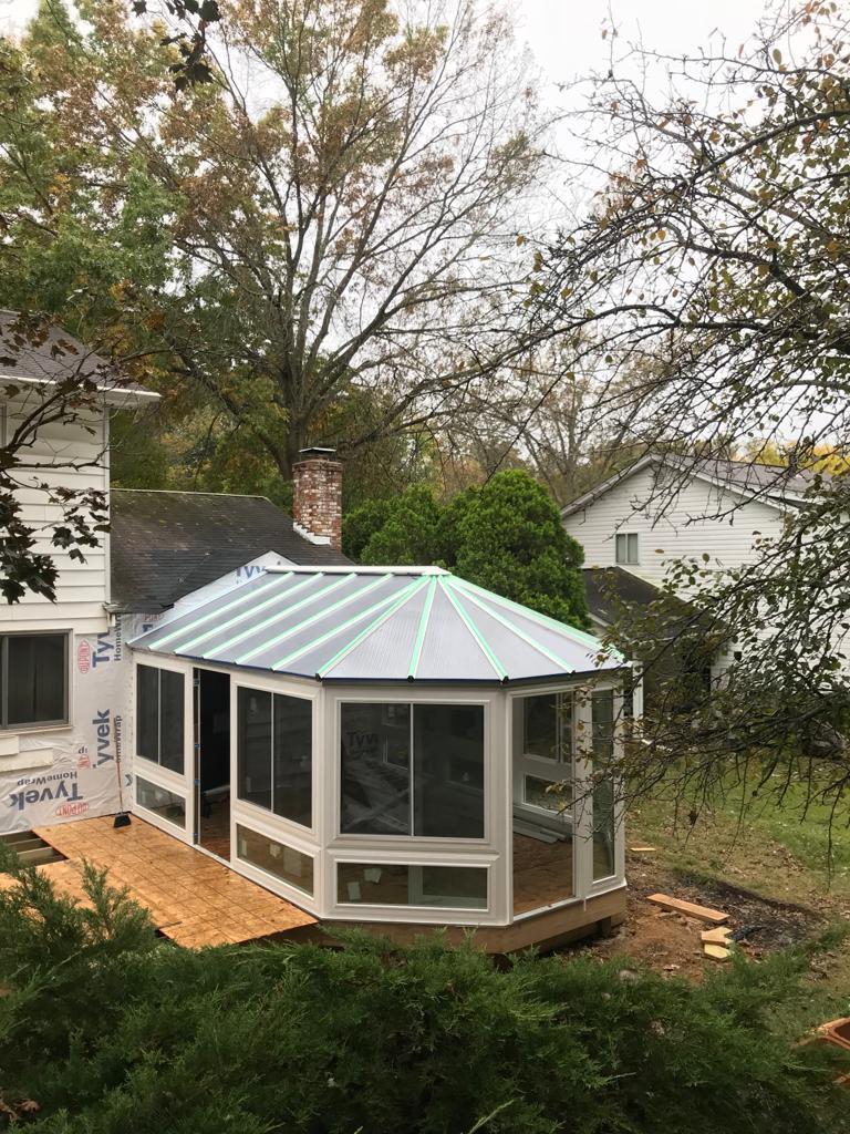 Custom solarium sunroom addition with conservatory roof